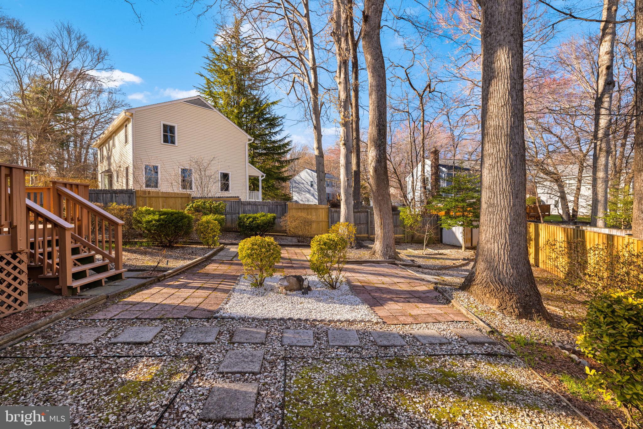 9451 Lapstrake Lane Burke, VA 22015 - Photo 48 of 59 a view of a house with backyard and sitting area