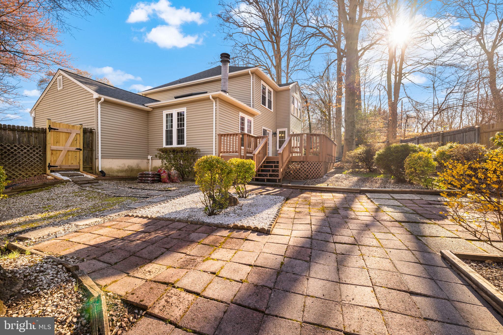 9451 Lapstrake Lane Burke, VA 22015 - Photo 49 of 59 a front view of a house with a yard