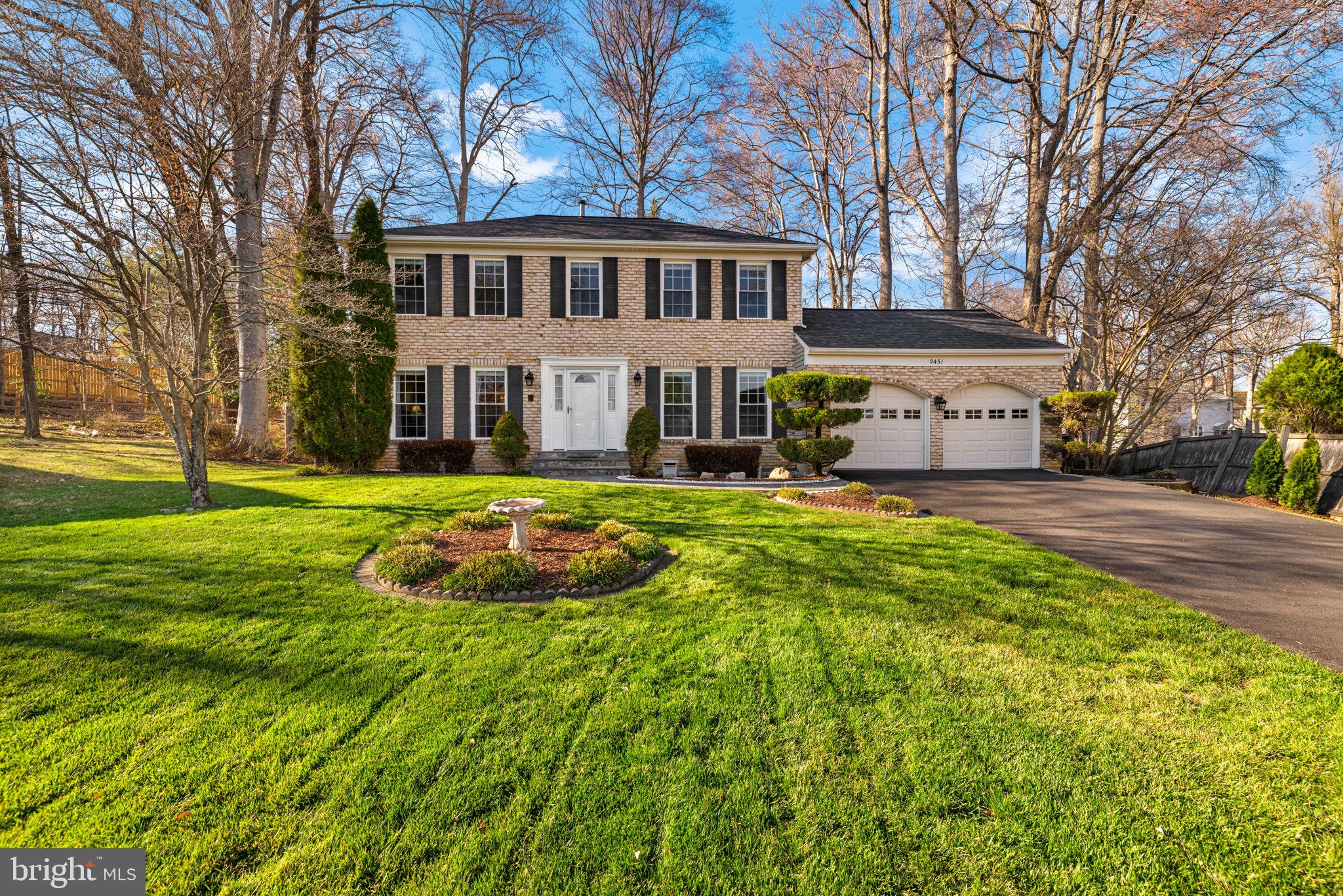 9451 Lapstrake Lane Burke, VA 22015 - Photo 57 of 59 front view of a house with a yard