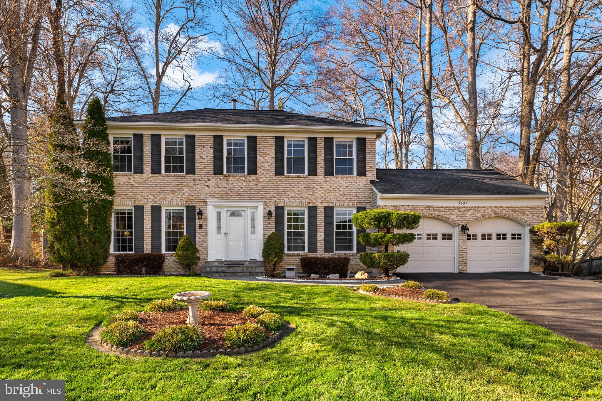 9451 Lapstrake Lane Burke, VA 22015 - Photo 58 of 59 a front view of a house with yard