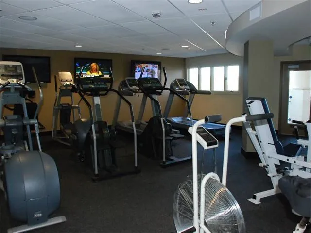 a view of a patio with a table and chairs