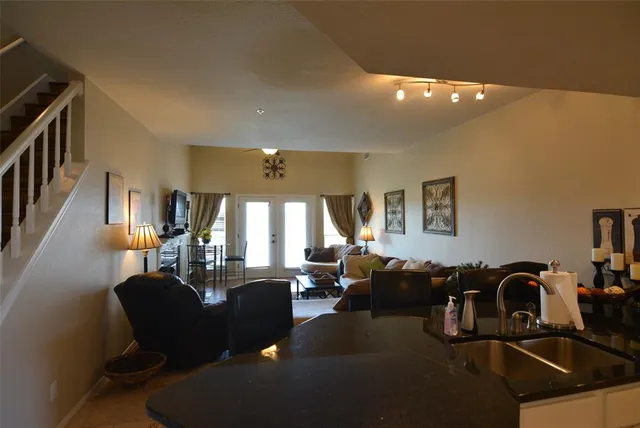 a view of a living room and dining room