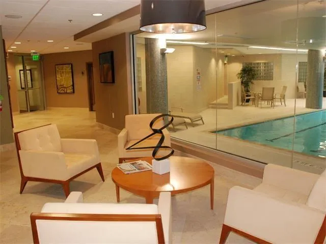 a view of a lobby with furniture and a gate