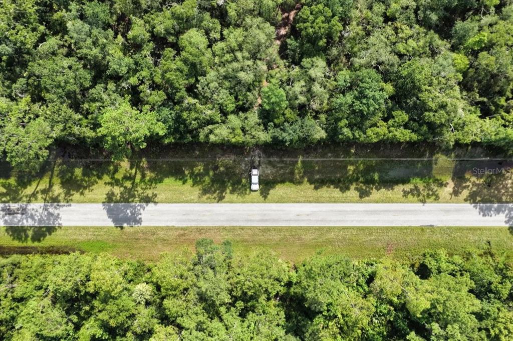 0 Southwest County Road 347 Cedar Key, FL 32625 - Photo 15 of 31 a view of a lake with a yard