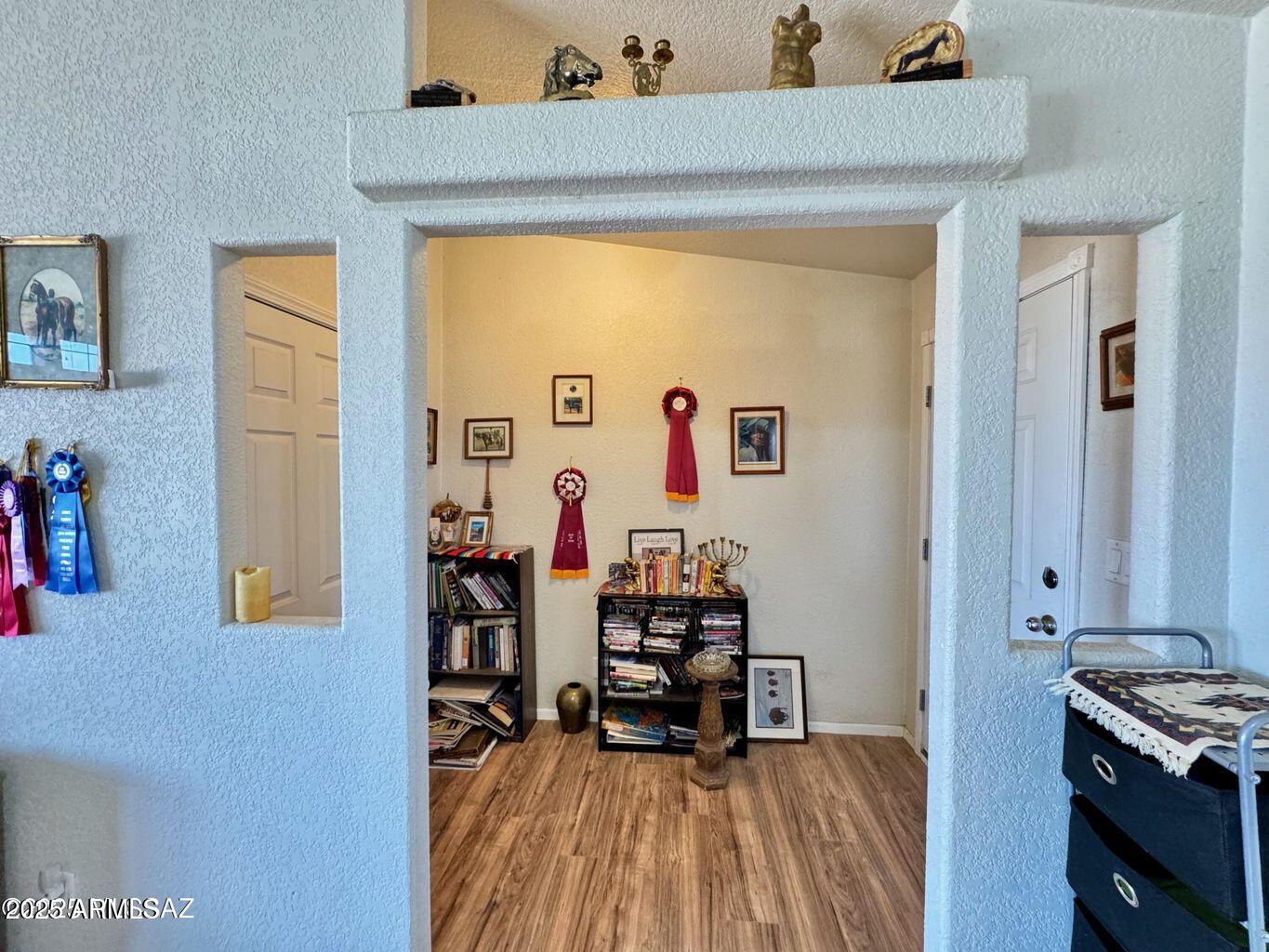 2627 West Hansen Road Willcox, AZ 85643 - Photo 10 of 42 a view of kitchen with furniture and wooden floor