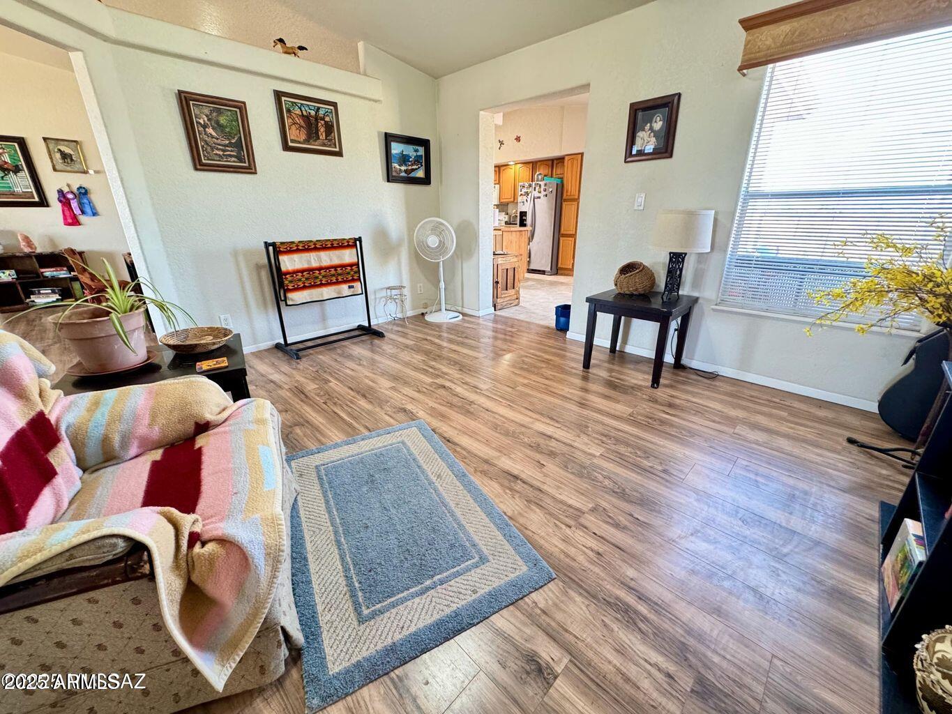 2627 West Hansen Road Willcox, AZ 85643 - Photo 15 of 42 a living room with furniture and a table