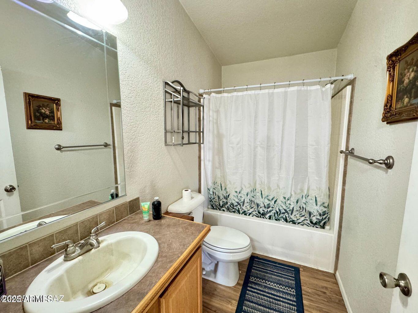 2627 West Hansen Road Willcox, AZ 85643 - Photo 28 of 42 a bathroom with a sink and a mirror