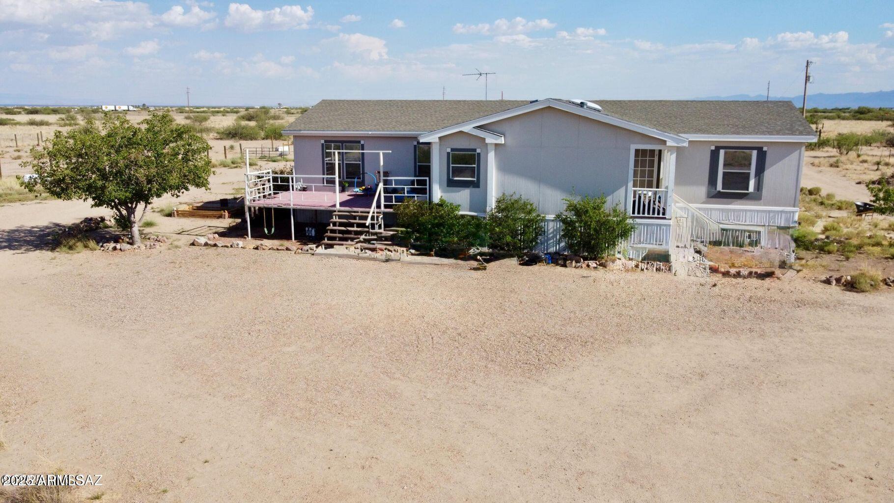2627 West Hansen Road Willcox, AZ 85643 - Photo 2 of 42 a view of a house with a patio