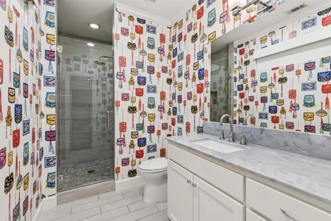 a bedroom with bed and window