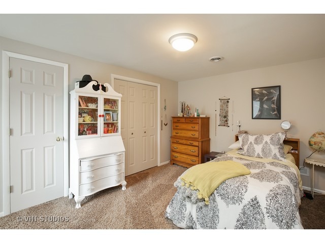 3N873 Cibis Road St. Charles, IL 60175 - Photo 13 of 19 a bedroom with a bed and a view of bathroom