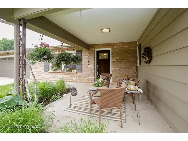 3N873 Cibis Road St. Charles, IL 60175 - Photo 19 of 19 a view of a patio with table and chairs and potted plants