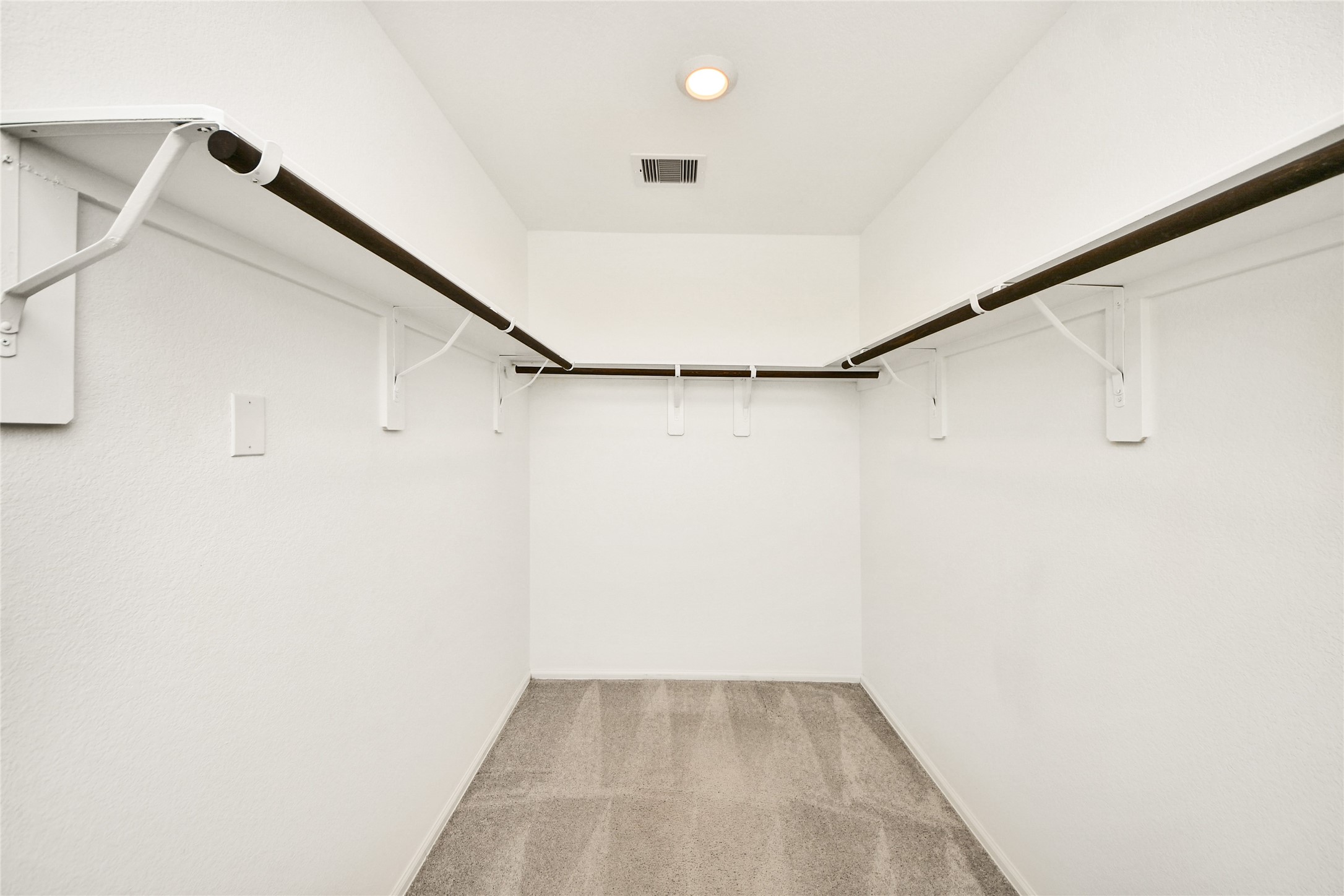 5011 Stratton Lane Rosharon, TX 77583 - Photo 19 of 38 a view of small space with racks on the wall