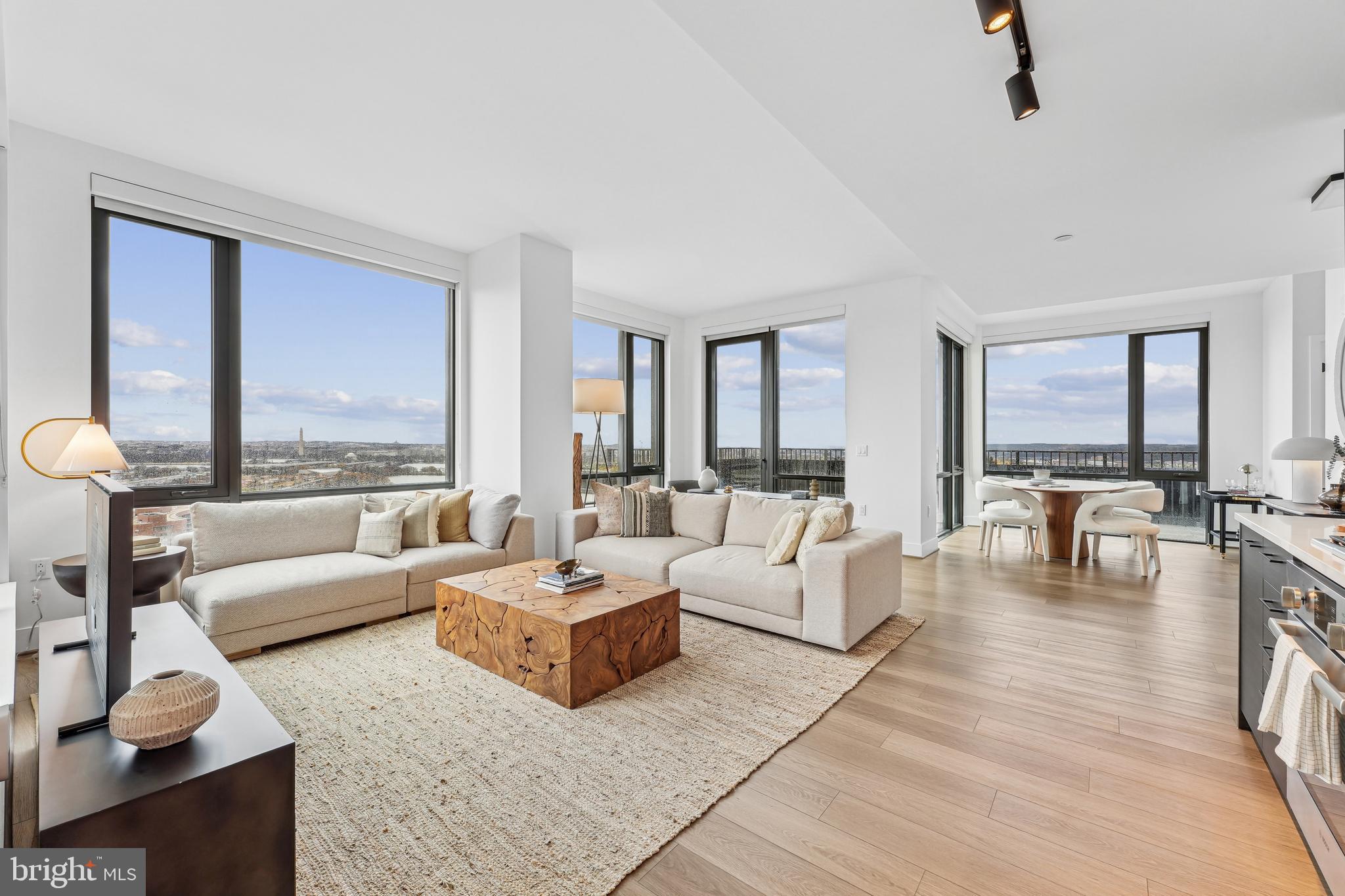 269 19th Court South, Unit 2315 Arlington, VA 22202 - Photo 1 of 48 a living room with furniture and a large window