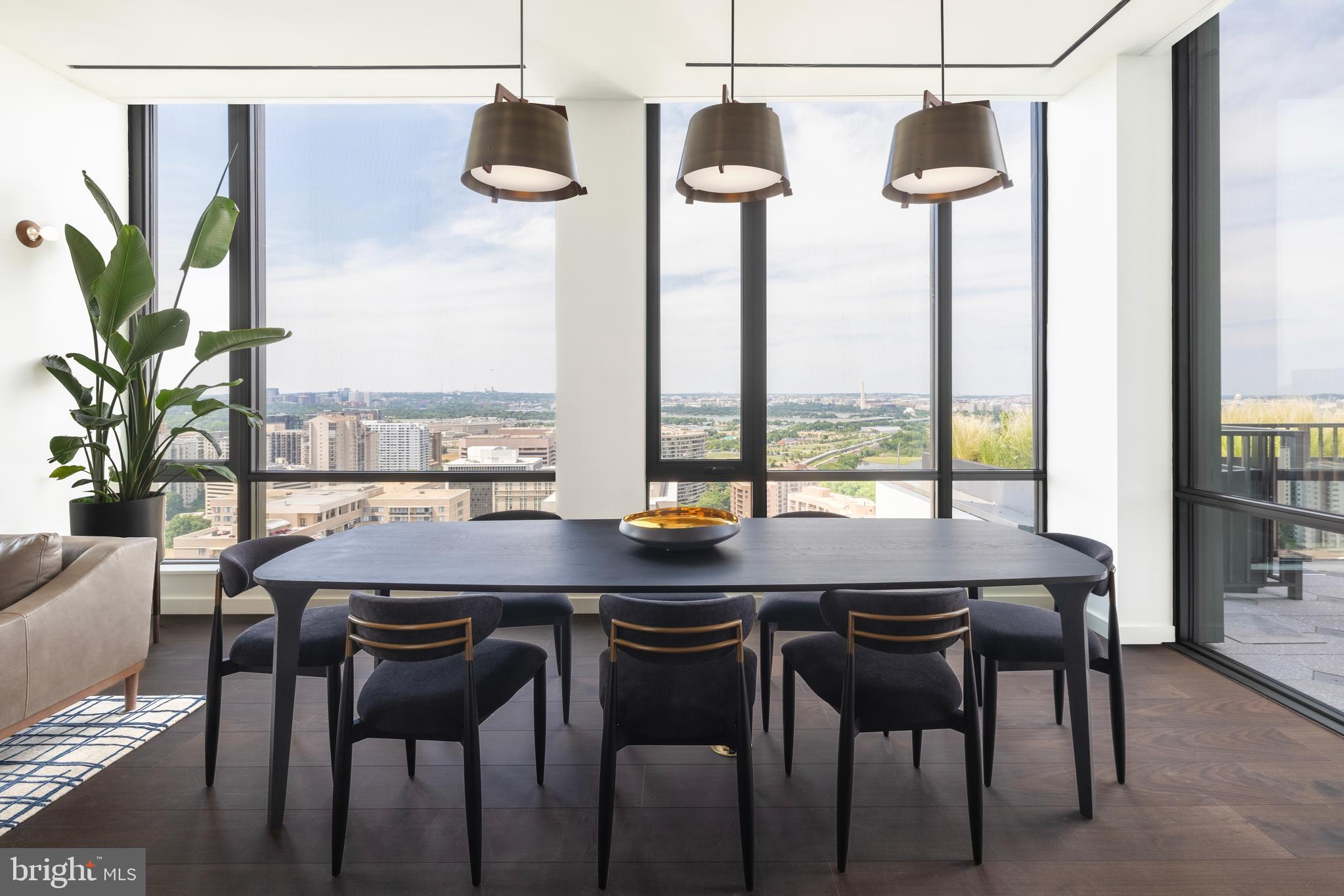 269 19th Court South, Unit 2315 Arlington, VA 22202 - Photo 17 of 48 a dining room with furniture and window