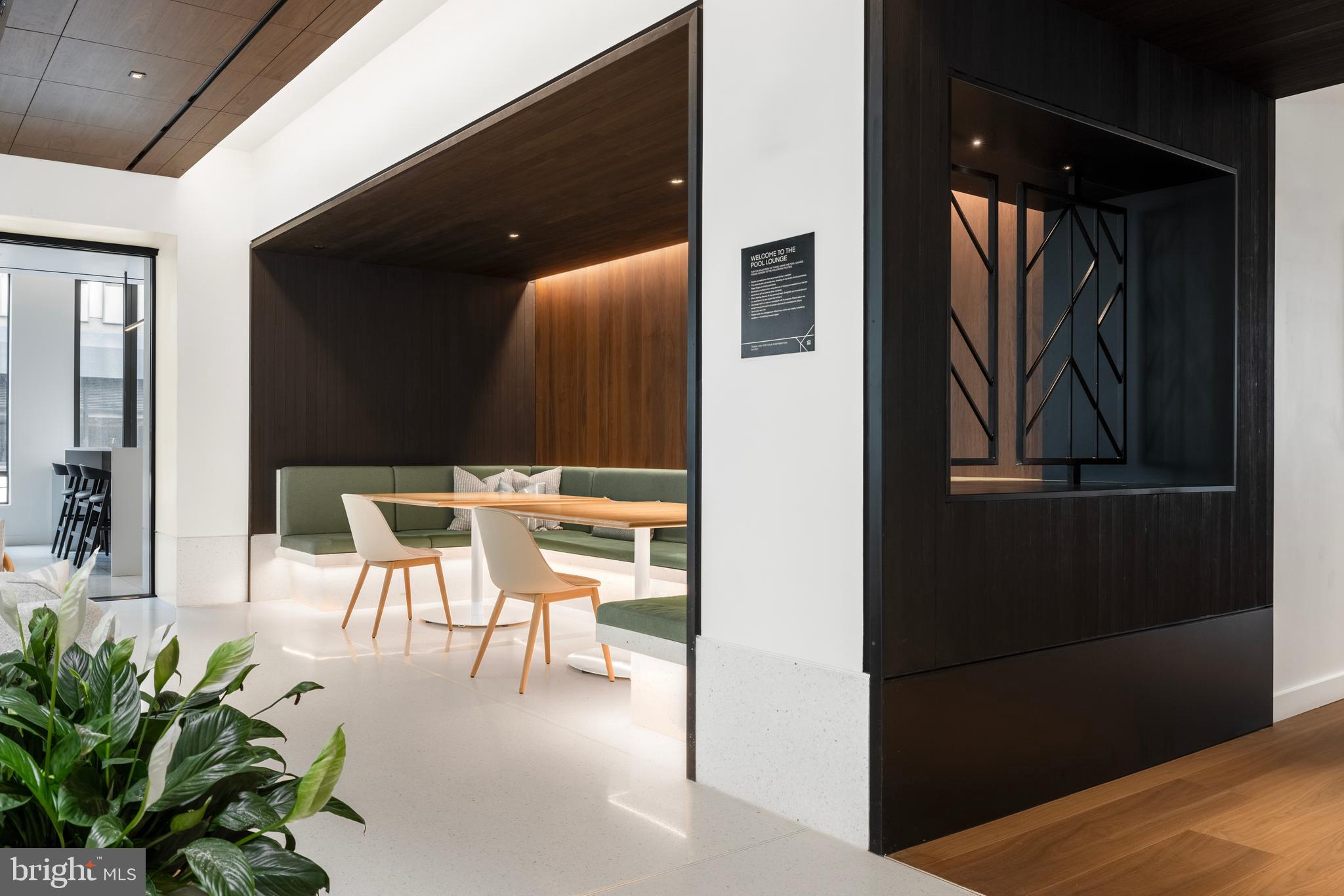 269 19th Court South, Unit 2315 Arlington, VA 22202 - Photo 23 of 48 a lobby with furniture and a potted plant