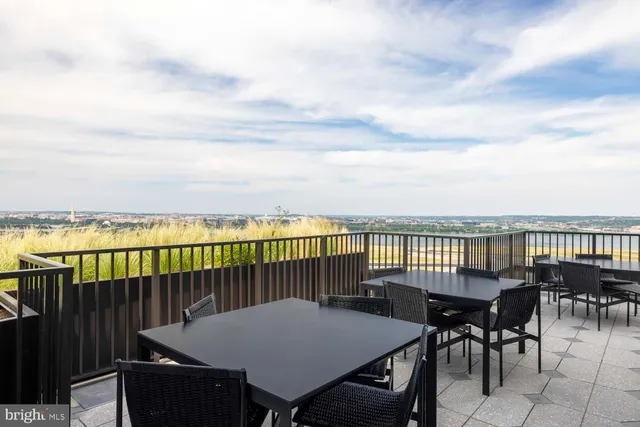 a view of a balcony with city view