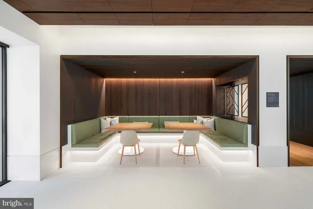 a kitchen with a table and chairs in it