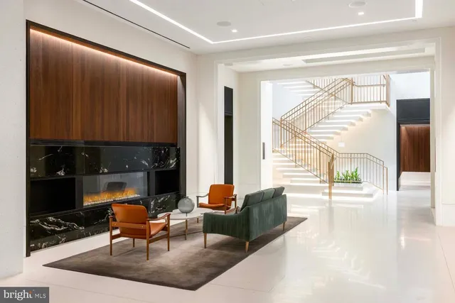 a view of swimming pool with outdoor seating