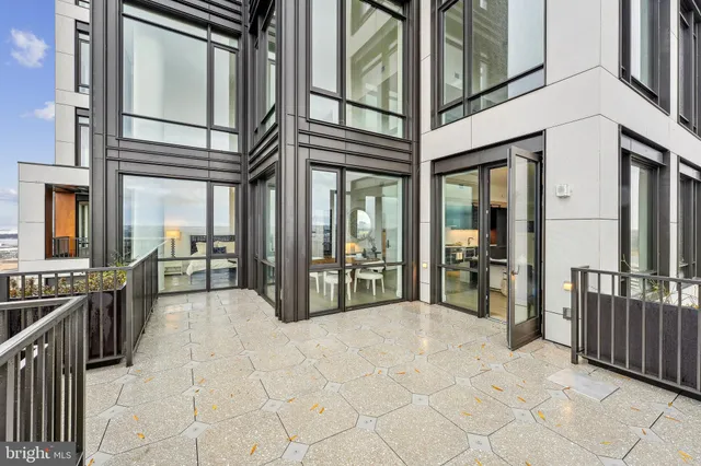 a bedroom with a large bed and a dresser