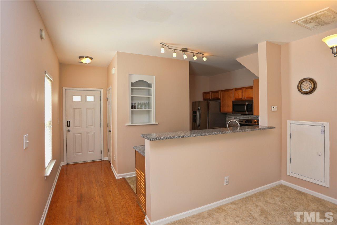 2134 Metacomet Way Raleigh, NC 27604 - Photo 2 of 25 a view of a kitchen cabinets and a livingroom
