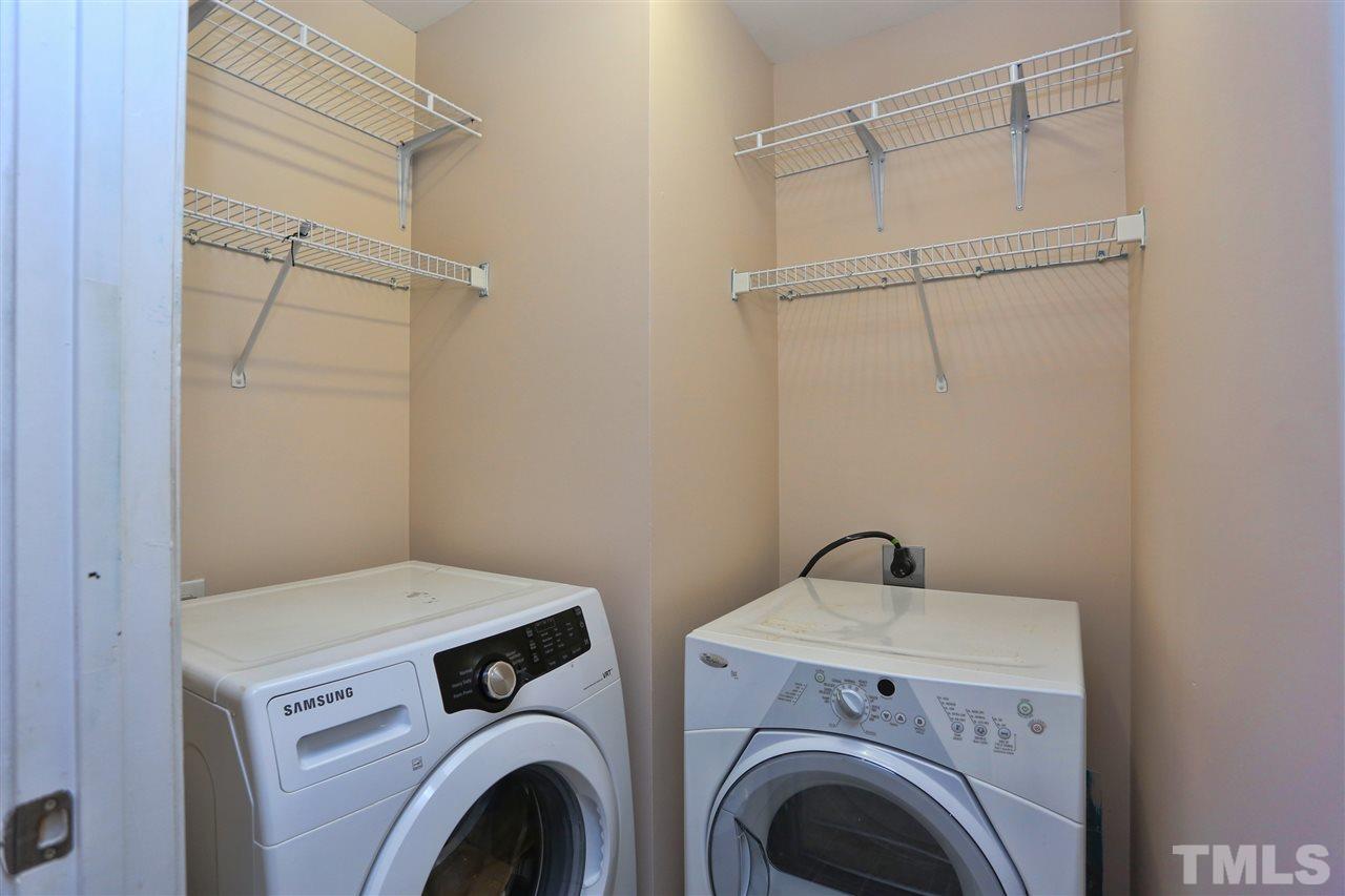 2134 Metacomet Way Raleigh, NC 27604 - Photo 21 of 25 a utility room with dryer and washer
