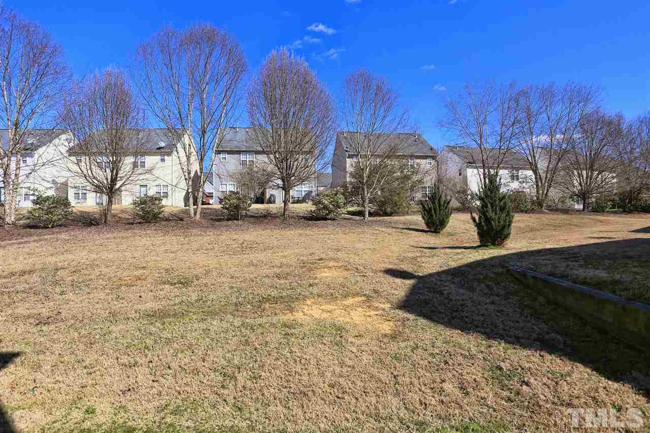2134 Metacomet Way Raleigh, NC 27604 - Photo 23 of 25 a view of a house with a yard