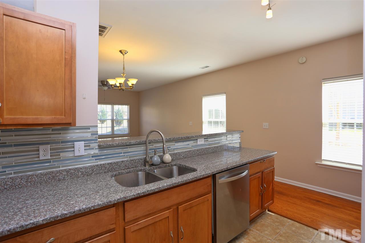 2134 Metacomet Way Raleigh, NC 27604 - Photo 8 of 25 a kitchen with a sink and a window