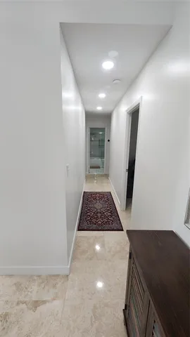 a view of hallway with windows