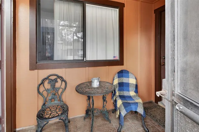 a table and chairs in a room