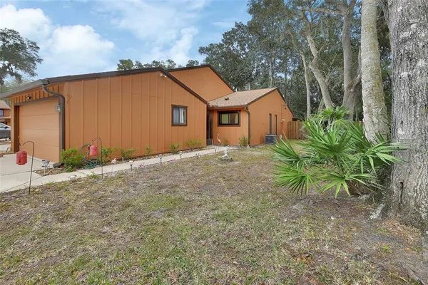 a house with trees in front of it