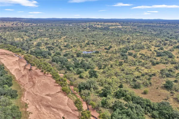 a view of a pathway with an outdoor space