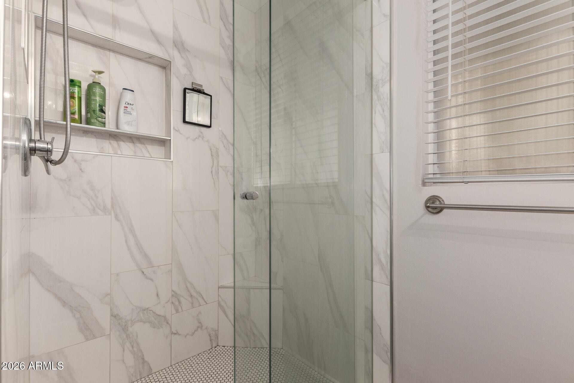 3270 East Camelback Road, Unit 213 Phoenix, AZ 85018 - Photo 19 of 41 a bathroom with a shower