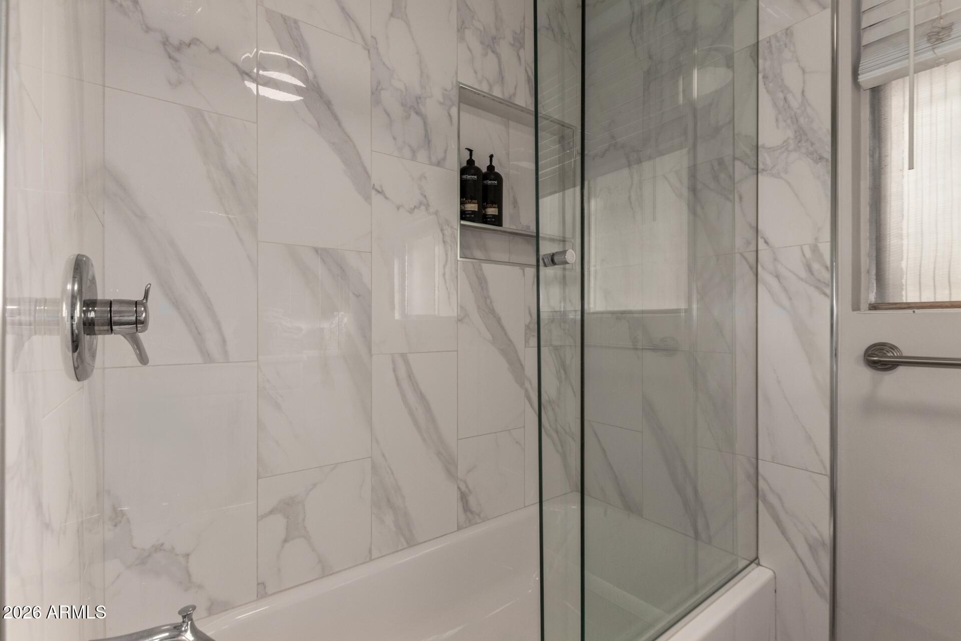 3270 East Camelback Road, Unit 213 Phoenix, AZ 85018 - Photo 24 of 41 a bathroom with a shower