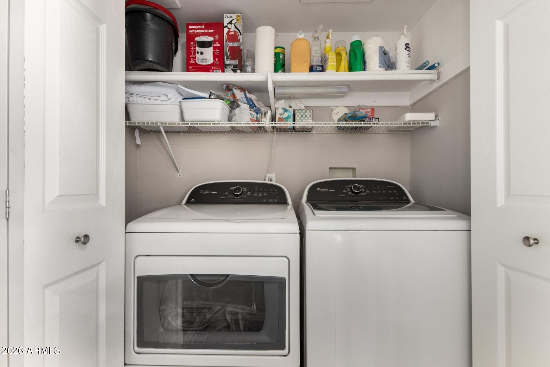 3270 East Camelback Road, Unit 213 Phoenix, AZ 85018 - Photo 25 of 41 a utility room with dryer and washer