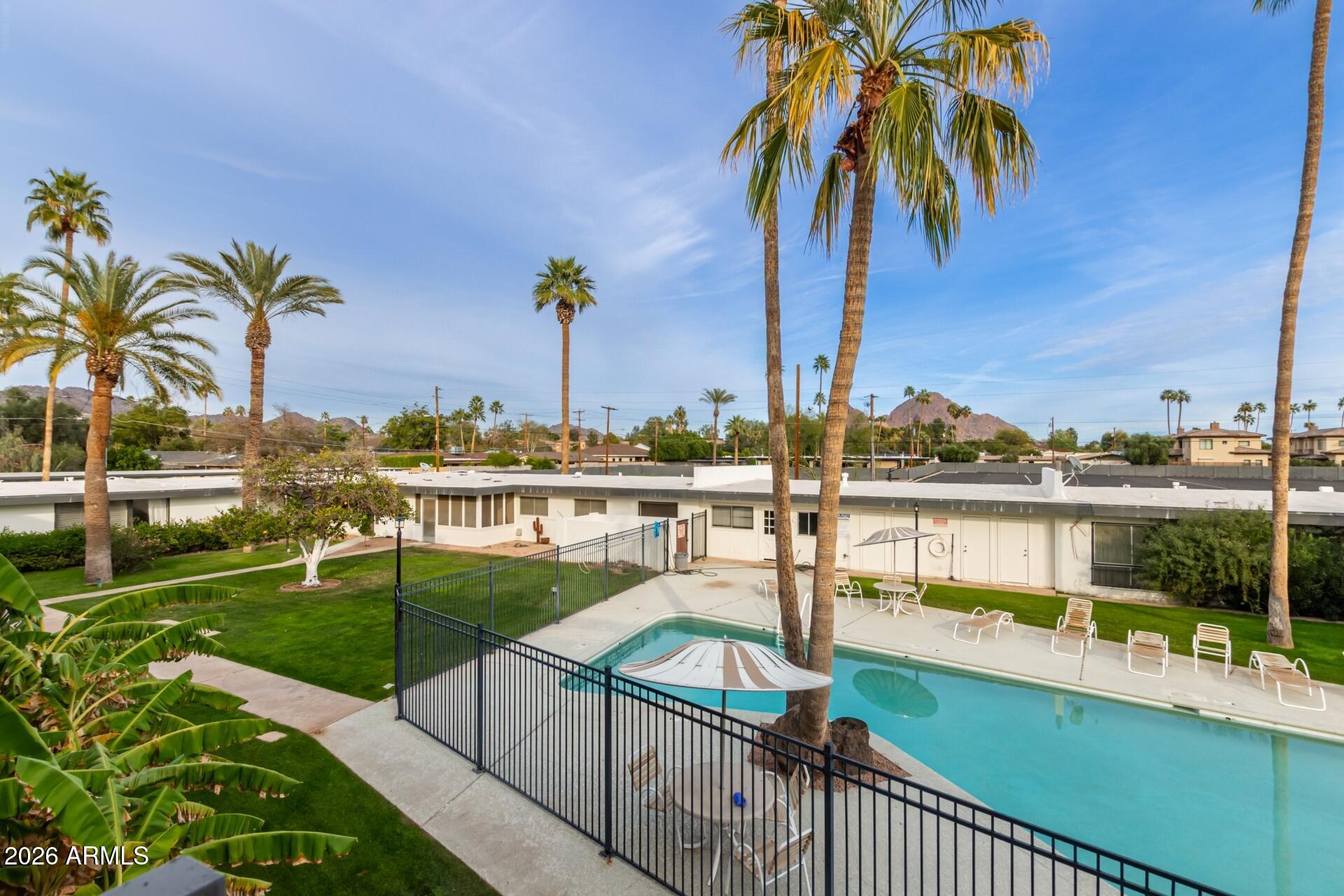 3270 East Camelback Road, Unit 213 Phoenix, AZ 85018 - Photo 28 of 41 a view of a lake with a ocean view