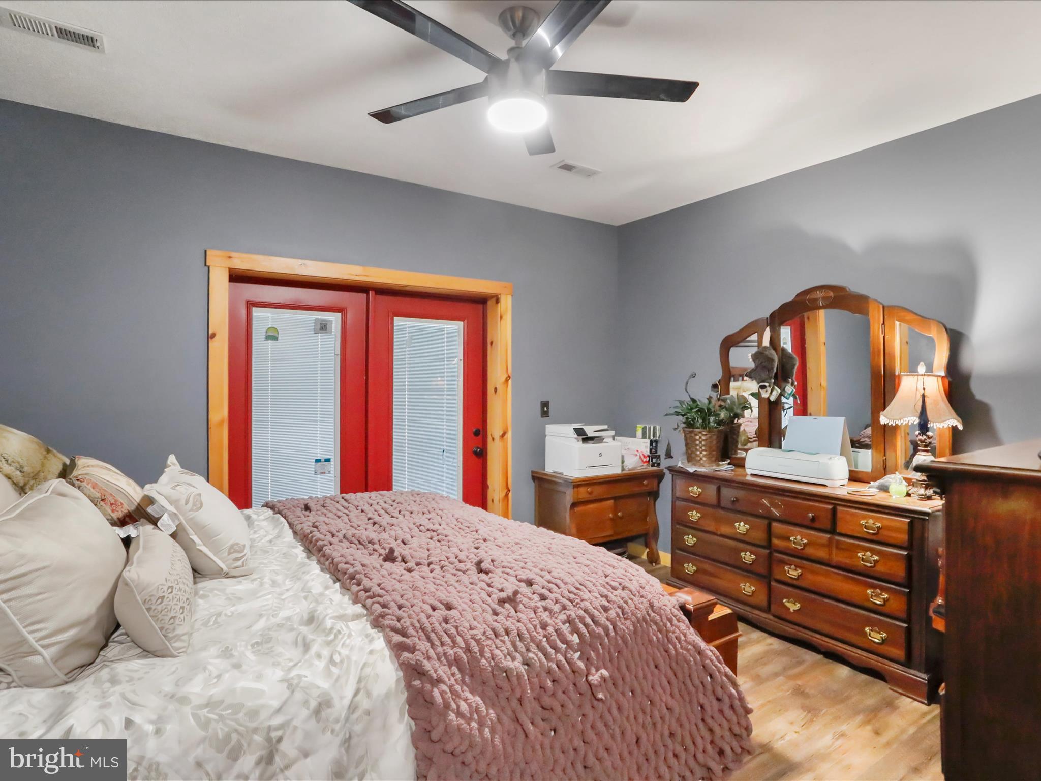 480 High Mountain Road Romney, WV 26757 - Photo 12 of 46 a bedroom with a bed and a dresser
