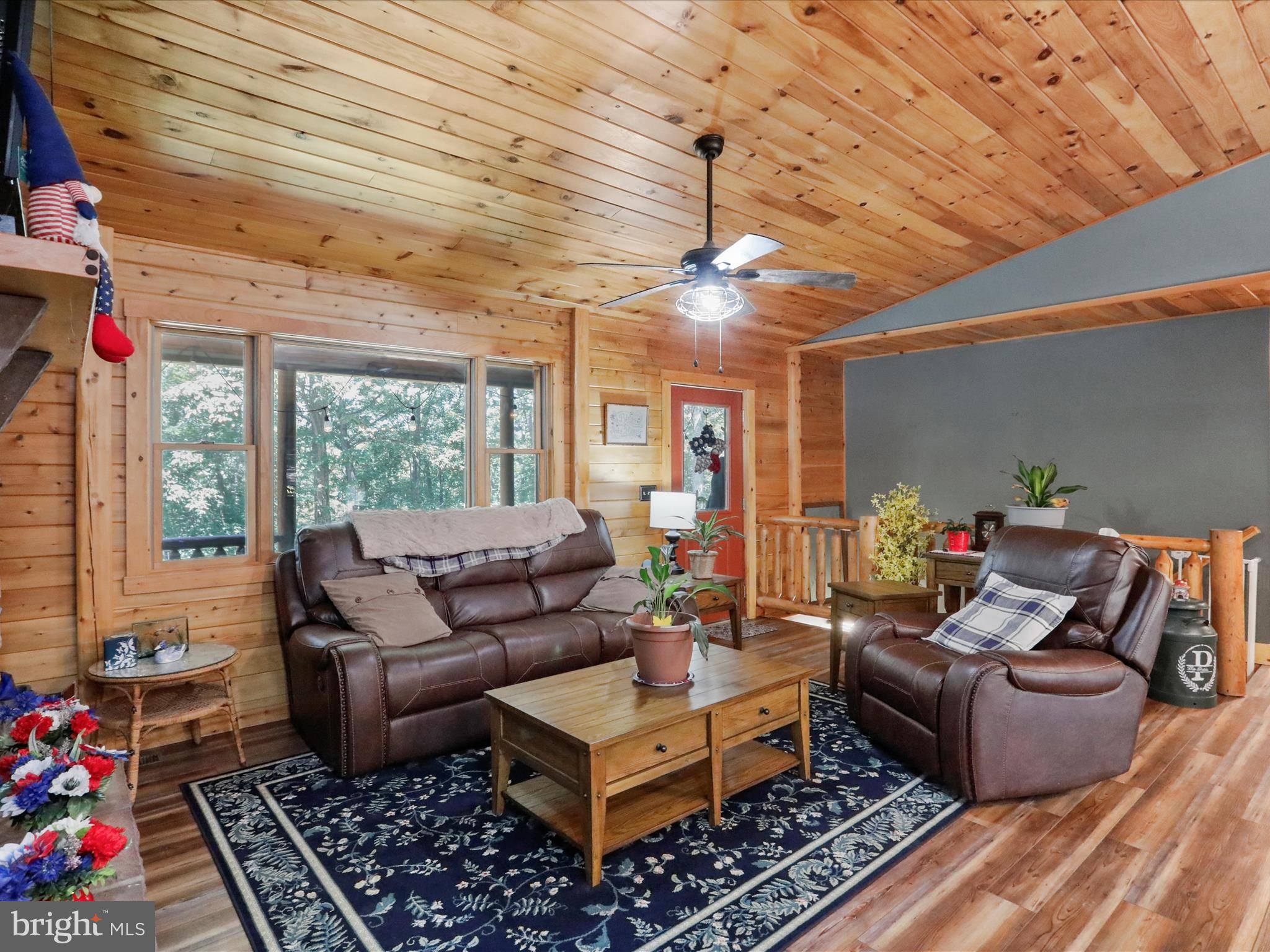 480 High Mountain Road Romney, WV 26757 - Photo 27 of 46 a living room with furniture and a chandelier