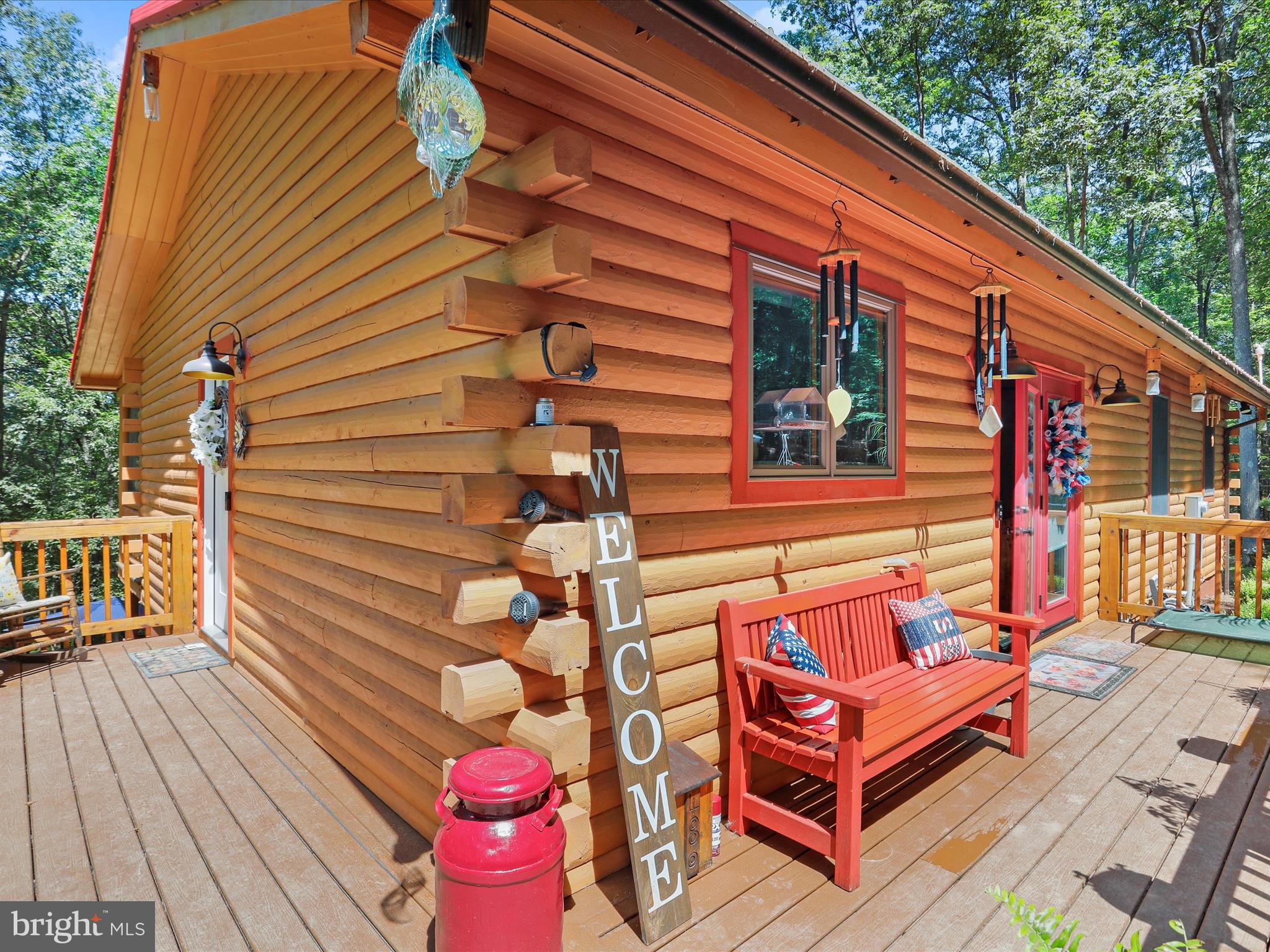 480 High Mountain Road Romney, WV 26757 - Photo 35 of 46 a backyard of a house with outdoor seating