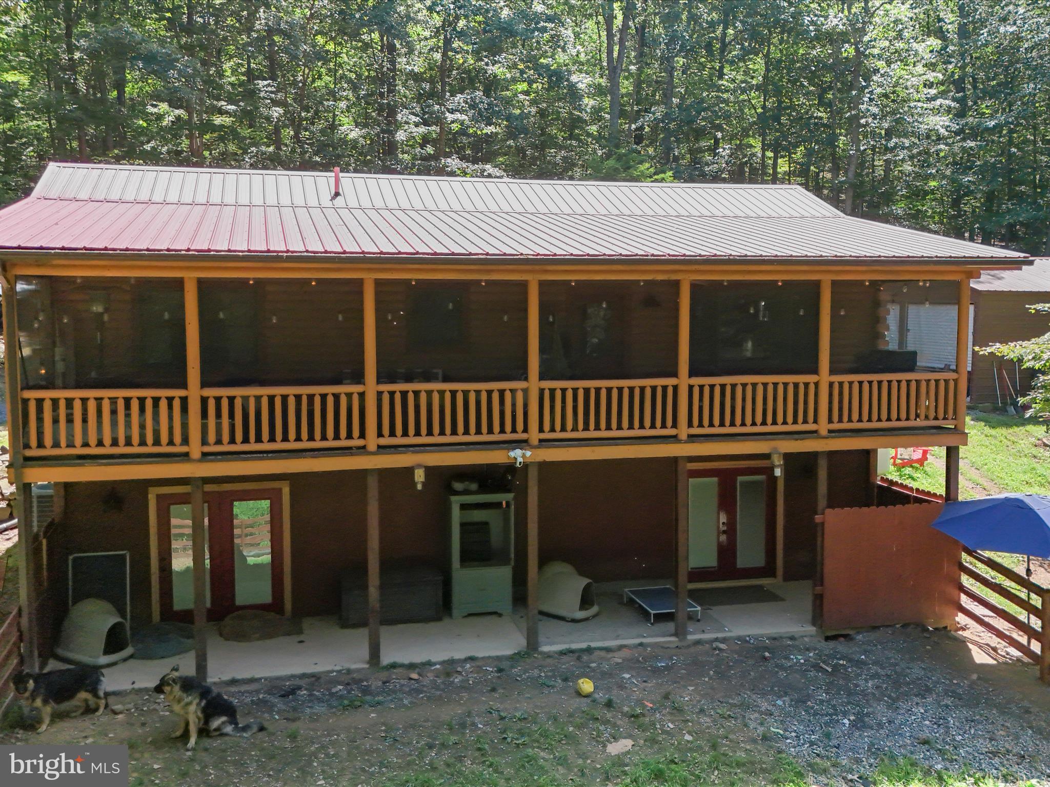480 High Mountain Road Romney, WV 26757 - Photo 45 of 46 a front view of a house with a yard