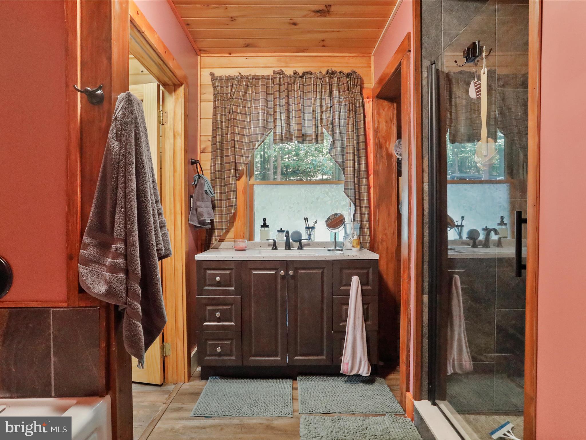 480 High Mountain Road Romney, WV 26757 - Photo 10 of 46 a view of walk in closet with clothes and shoes