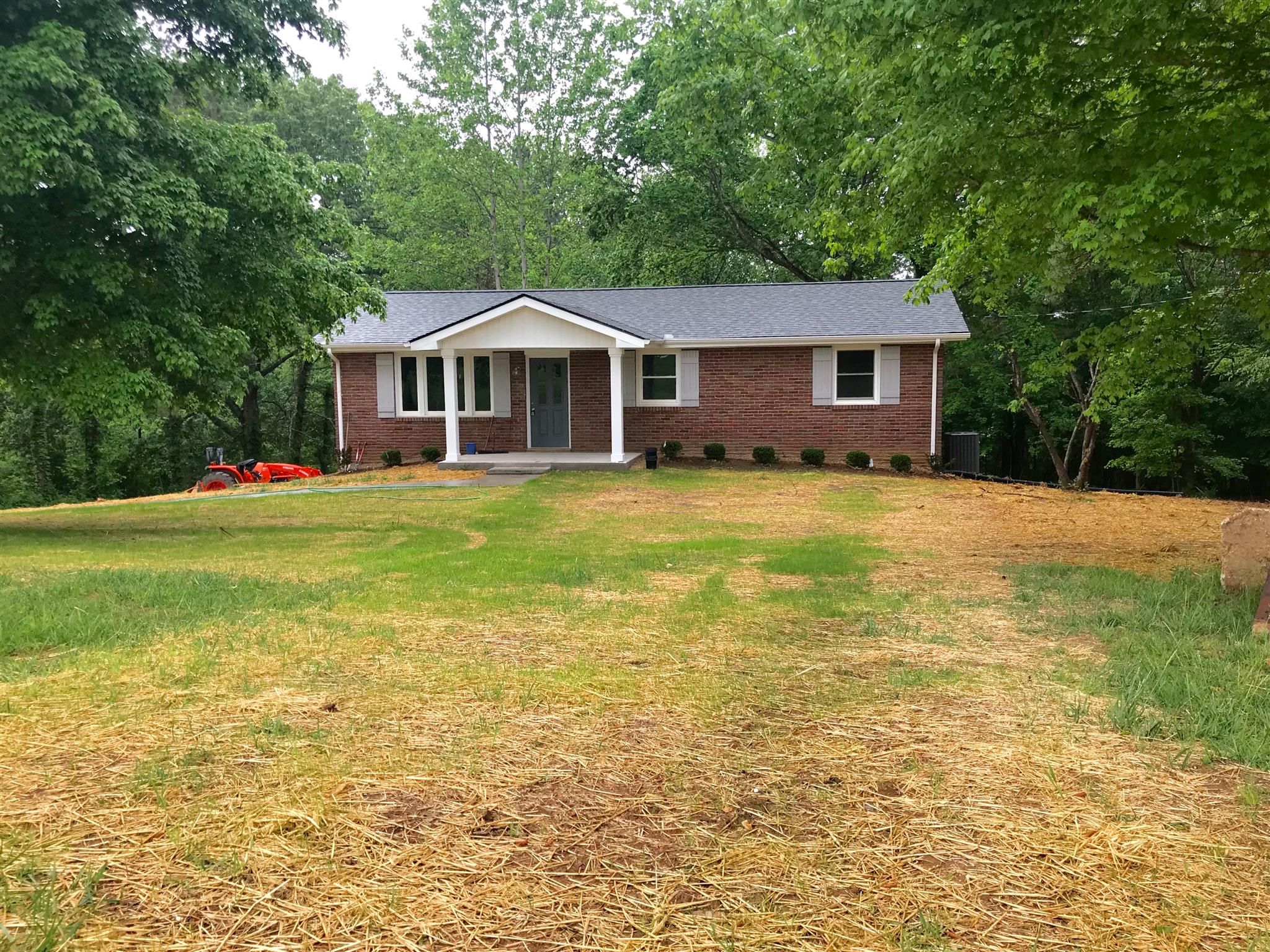 1047 Salem Ridge Road Clarksville, TN 37040 - Photo 1 of 17 a front view of a house with a yard
