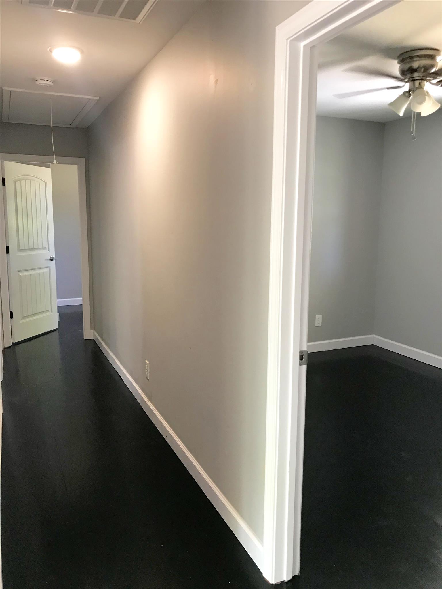 1047 Salem Ridge Road Clarksville, TN 37040 - Photo 11 of 17 a view of hallway with wooden floor