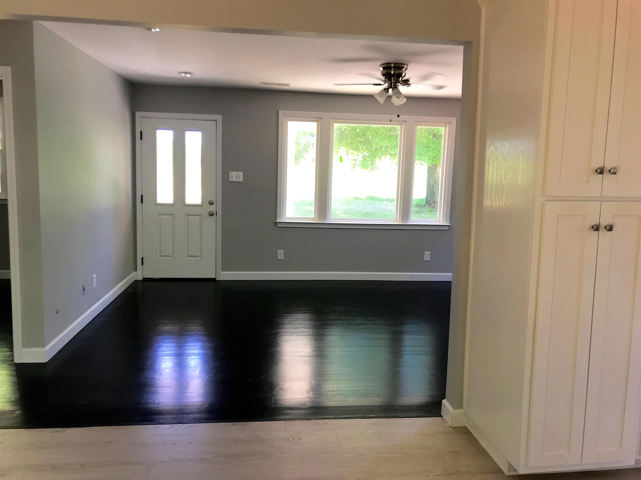 1047 Salem Ridge Road Clarksville, TN 37040 - Photo 6 of 17 a view of an empty room with wooden floor and a window