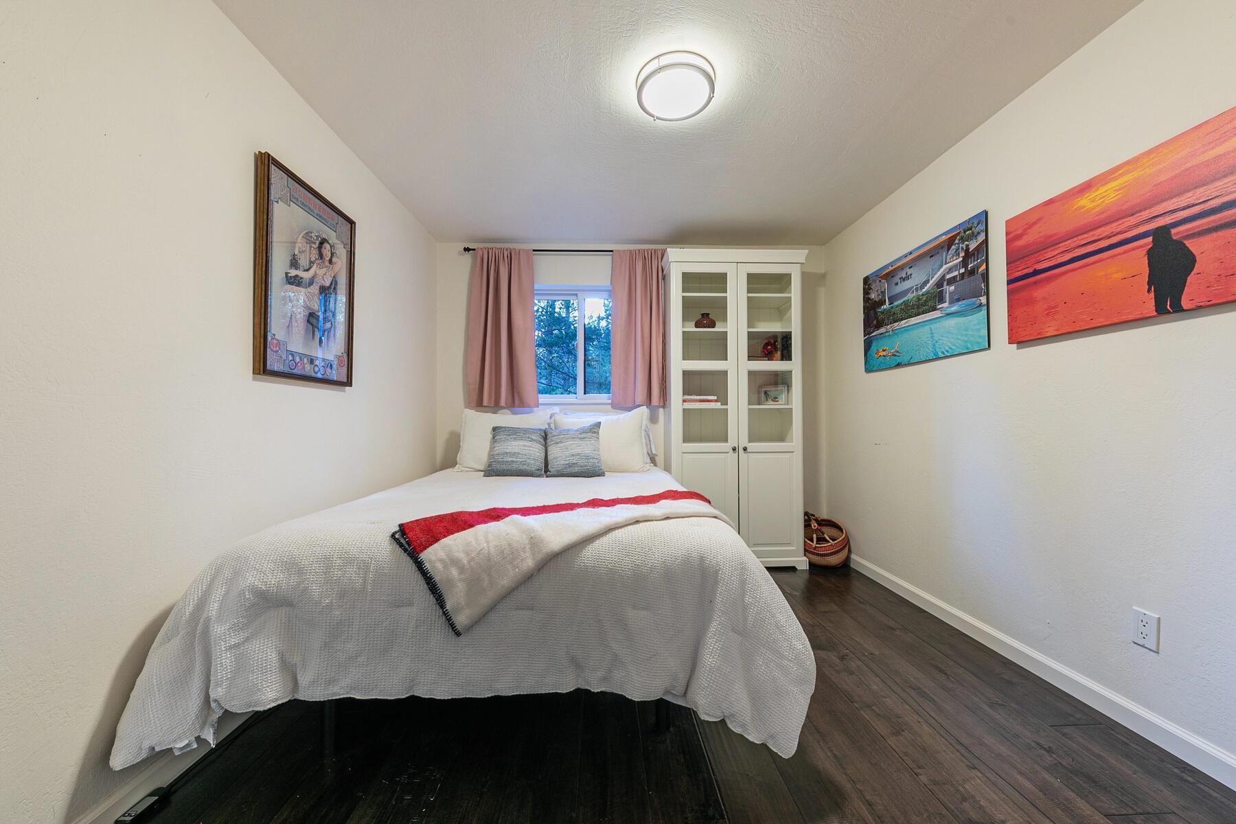 11568 Schussing Way Truckee, CA 96161 - Photo 17 of 28 a bedroom with a bed and a window