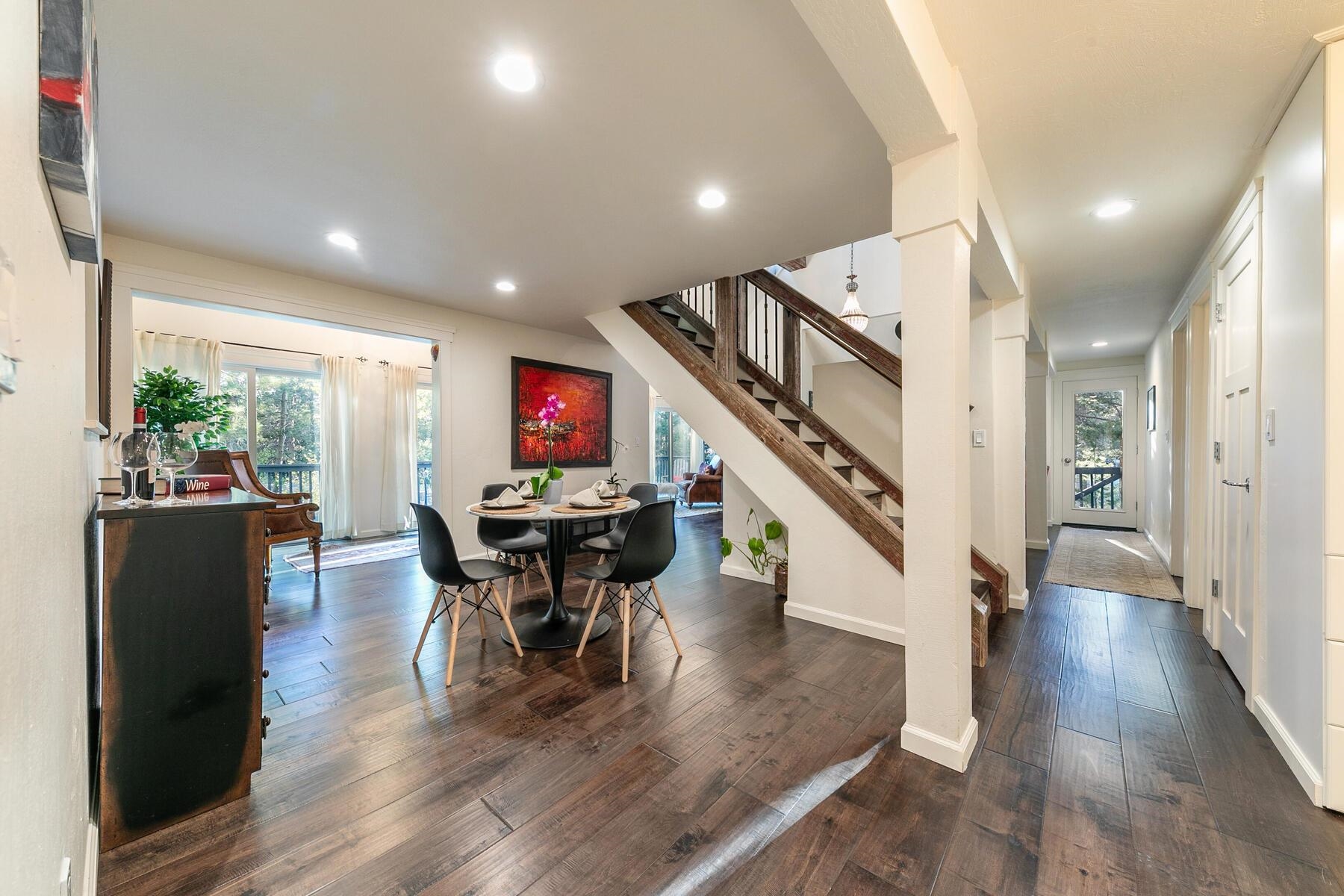 11568 Schussing Way Truckee, CA 96161 - Photo 4 of 28 a view of a dining room with furniture and wooden floor