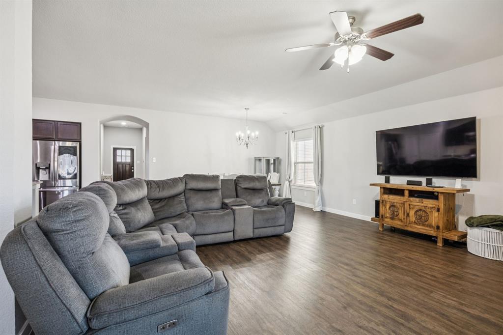 5112 Cathy Drive Forney, TX 75126 - Photo 10 of 32 a living room with furniture and a flat screen tv