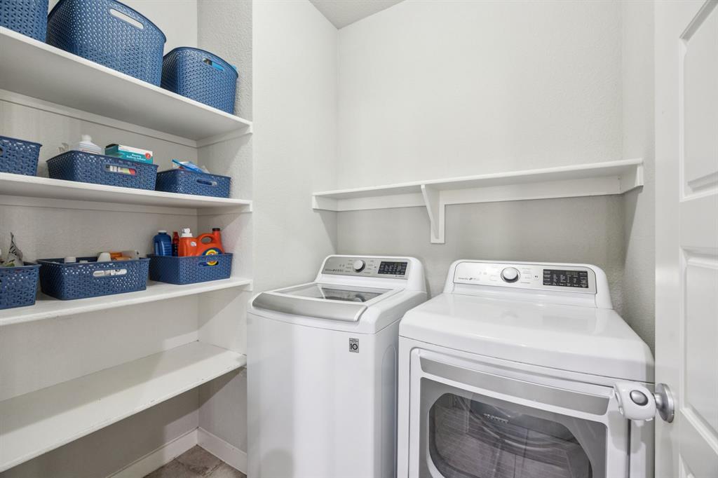 5112 Cathy Drive Forney, TX 75126 - Photo 16 of 32 a utility room with dryer and washer