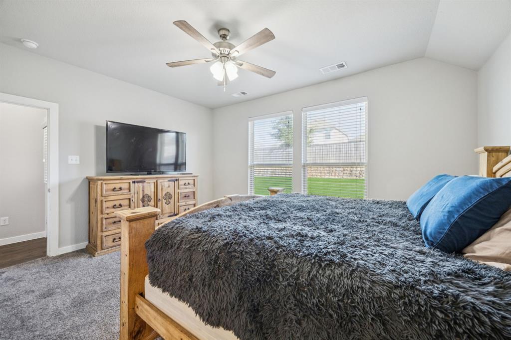 5112 Cathy Drive Forney, TX 75126 - Photo 18 of 32 a living room with furniture and a flat screen tv