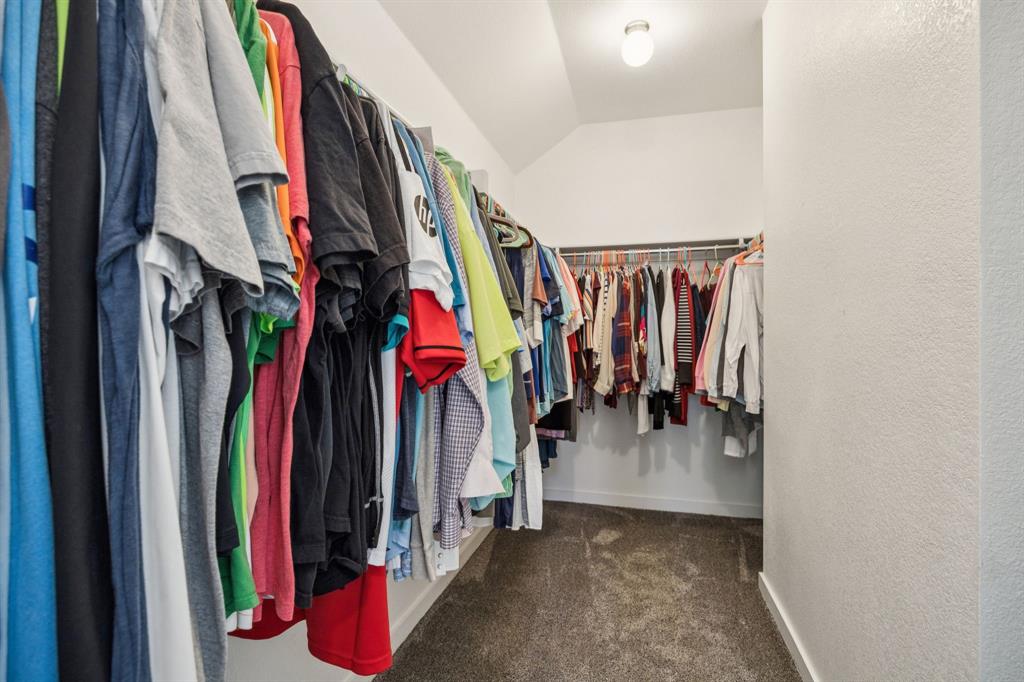 5112 Cathy Drive Forney, TX 75126 - Photo 22 of 32 a view of walk in closet with clothes