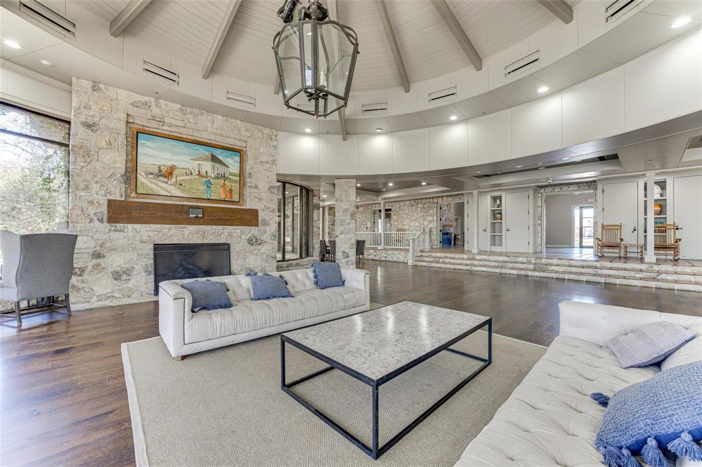 5112 Cathy Drive Forney, TX 75126 - Photo 26 of 32 a living room with furniture a table and kitchen view
